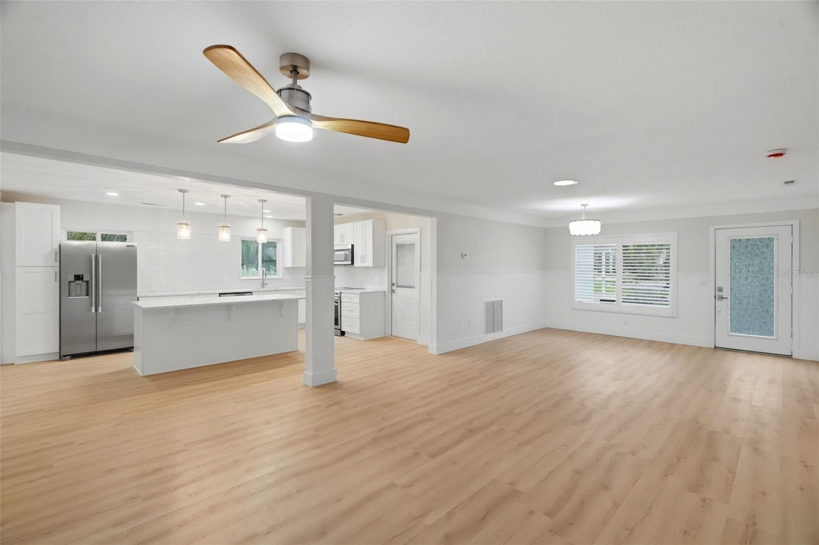 Living Room / Dining Room - 15814 3RD ST E, REDINGTON BEACH