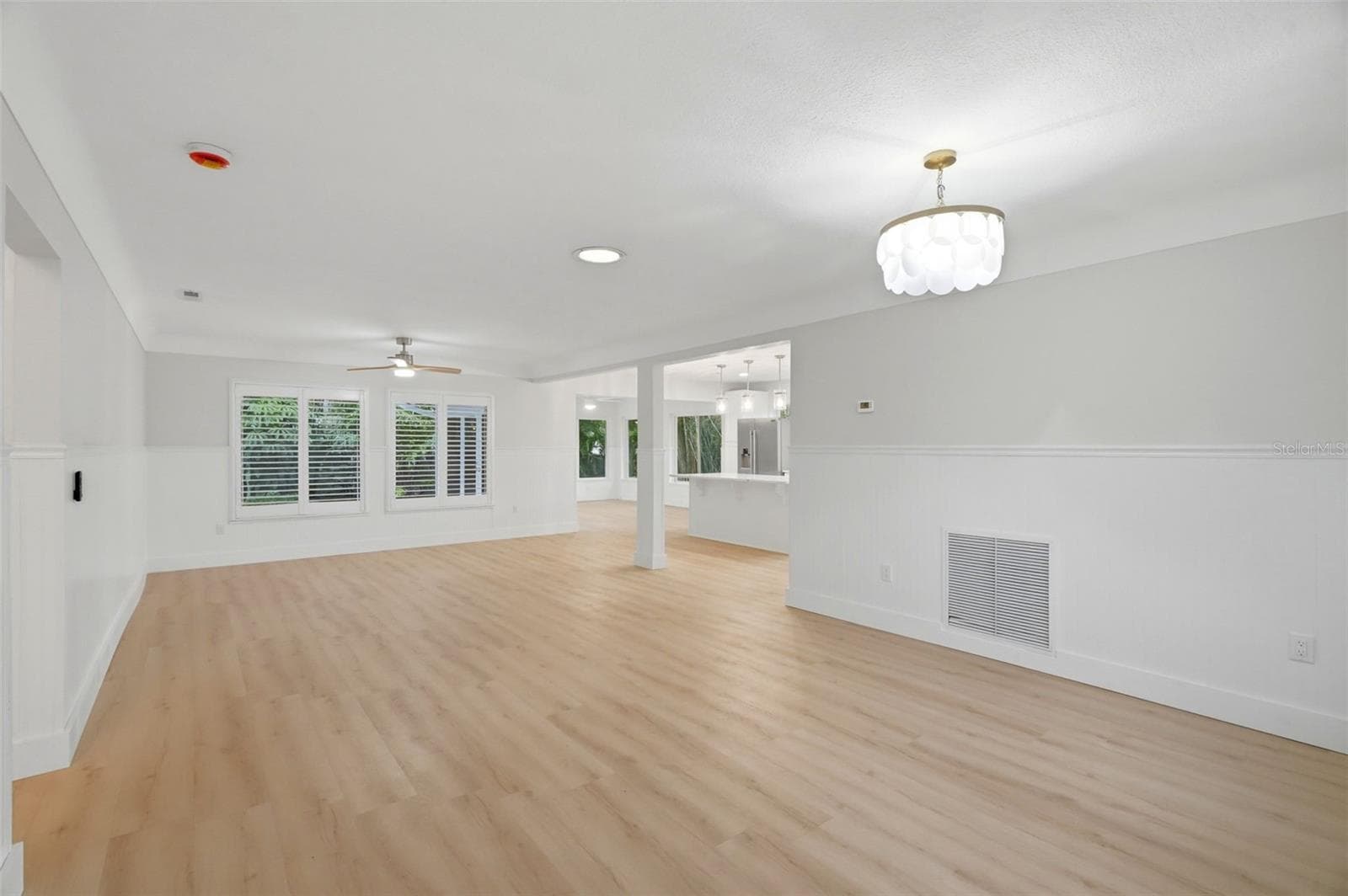 Living Room / Dining Room - 15814 3RD ST E, REDINGTON BEACH