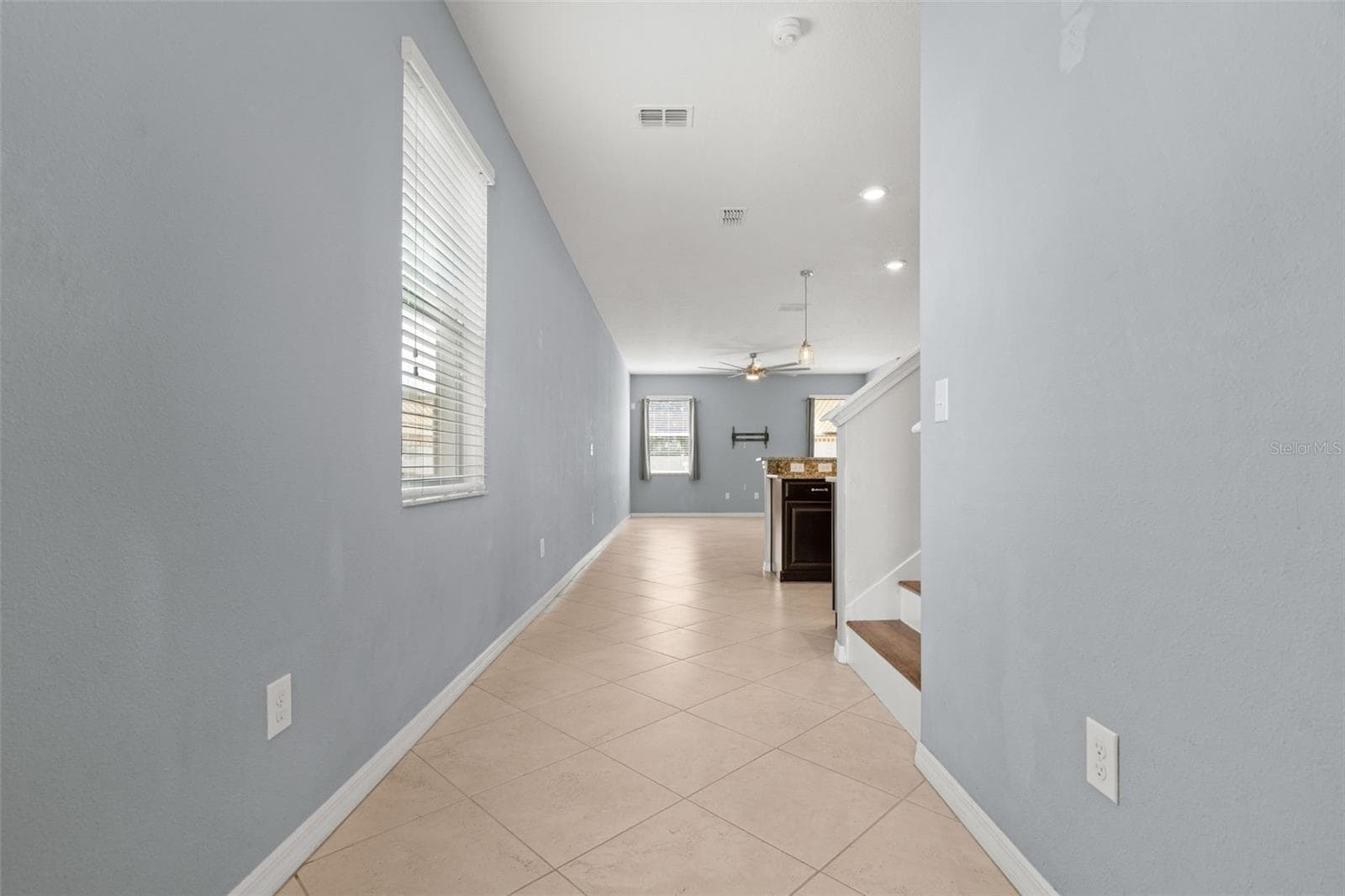 Entryway — Bright entryway opens into the spacious main living area and open-concept floor plan. - 13728 REINDEER CIR, HUDSON