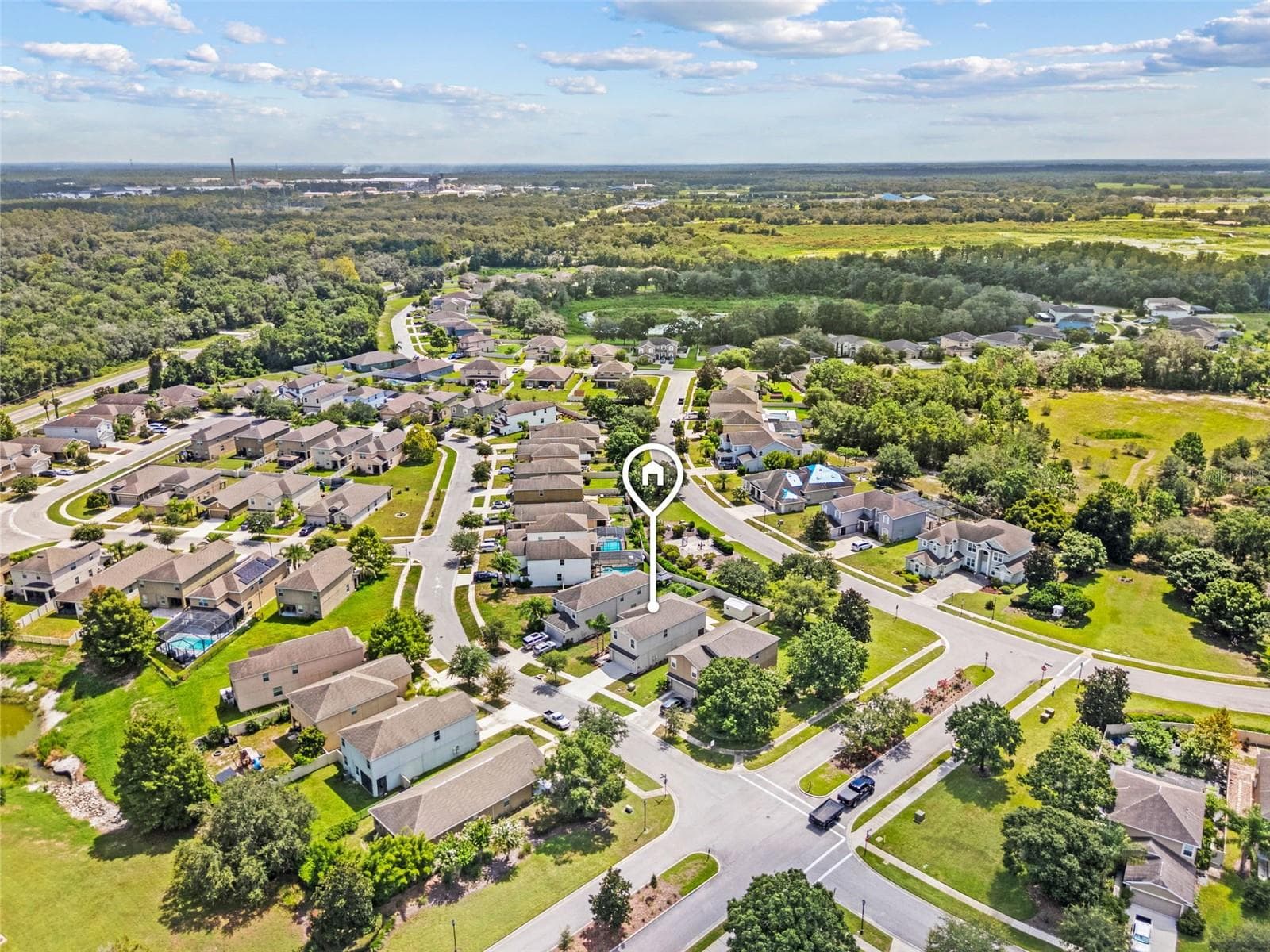 Community Aerial – Wide aerial view showcasing the home’s location within the Lakeside community and surrounding neighborhood. - 13728 REINDEER CIR, HUDSON