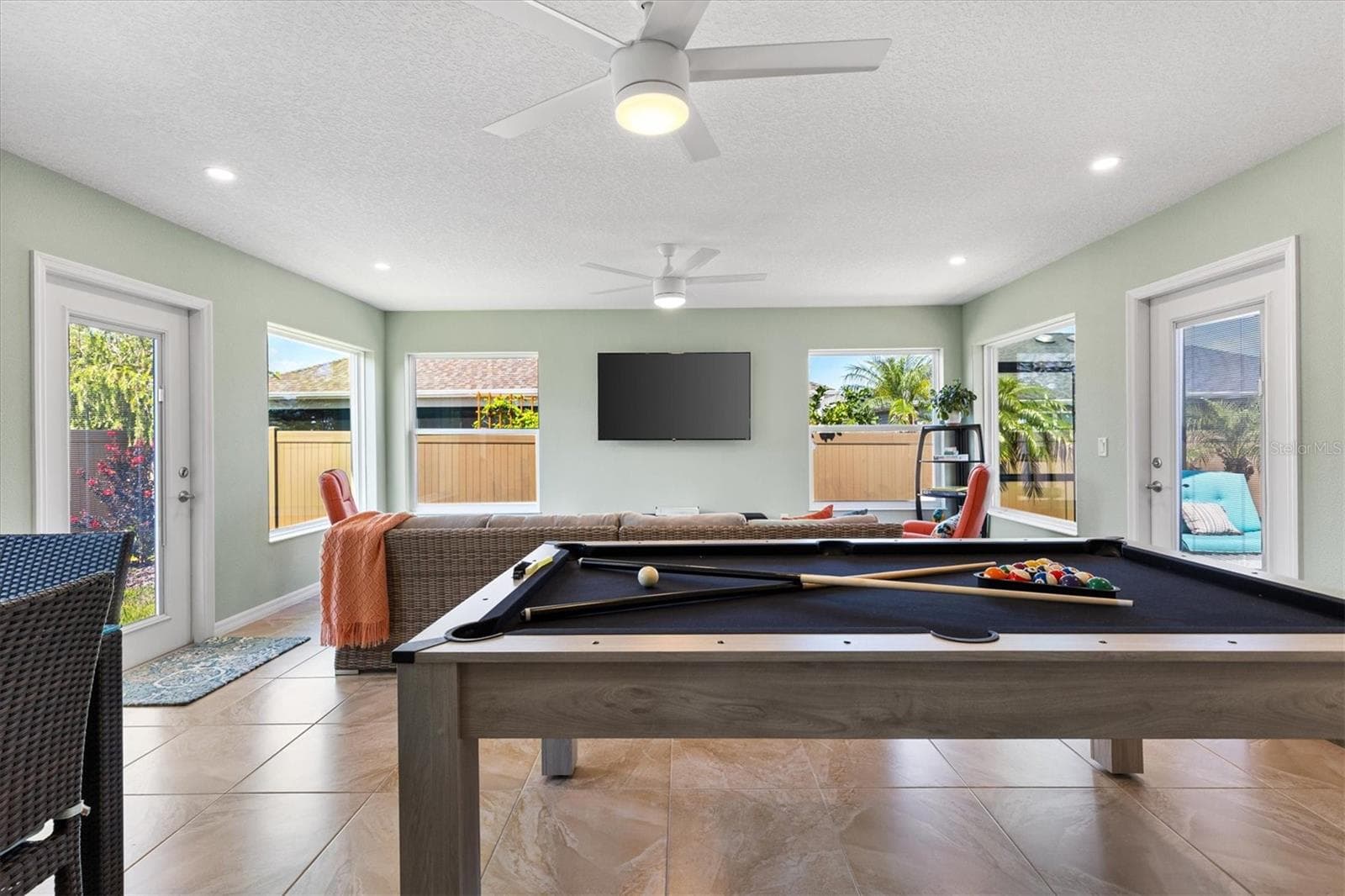 Florida room addition 500sq ft Under air Not included in the home SQ Footage - 5738 CARLEY LOOP, THE VILLAGES