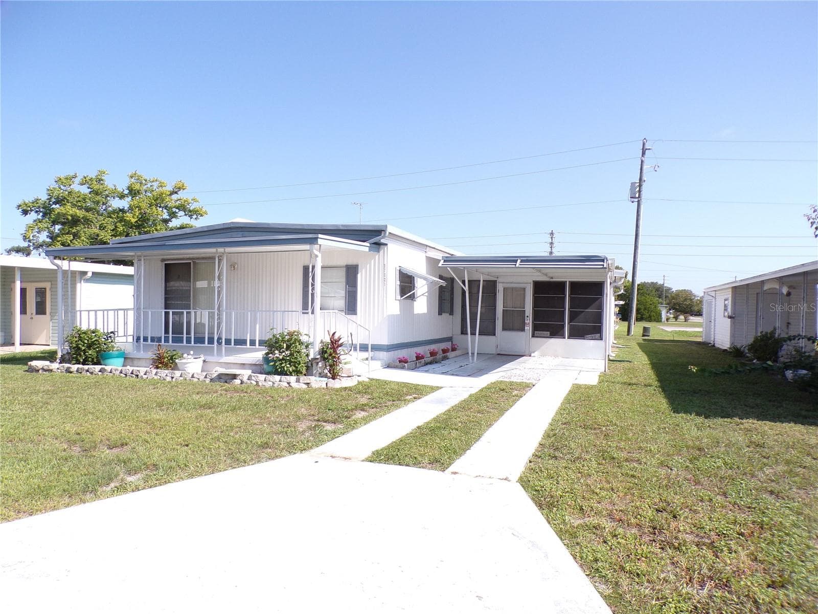 Mobile Home at 37021 SANDRA AVE, ZEPHYRHILLS, photo 2 of 34