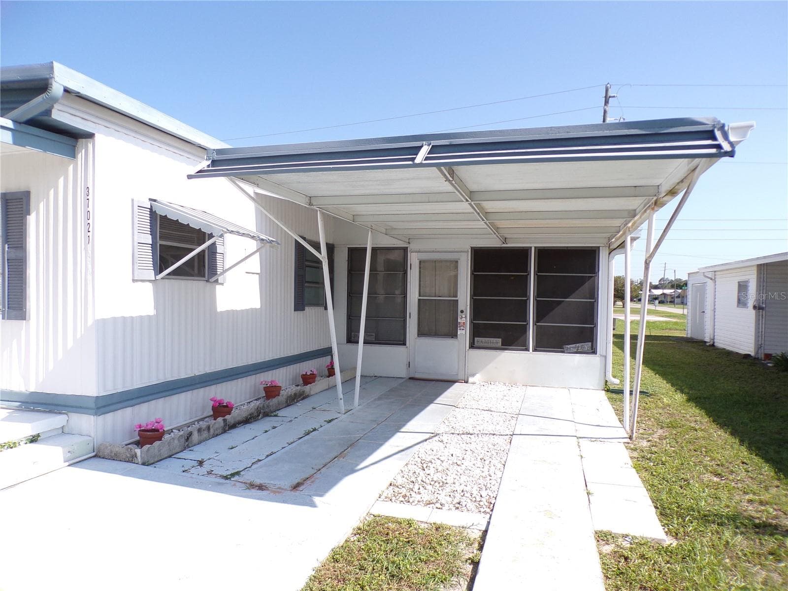 Mobile Home at 37021 SANDRA AVE, ZEPHYRHILLS, photo 3 of 34