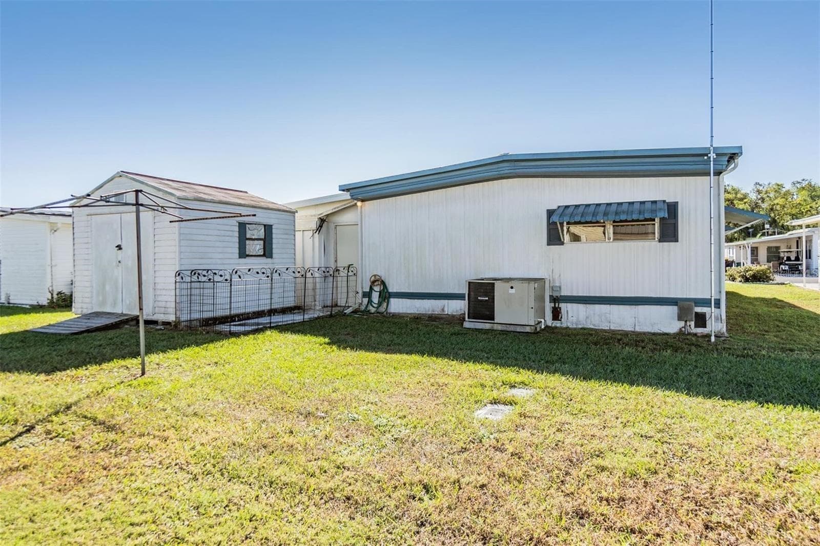 Mobile Home at 37021 SANDRA AVE, ZEPHYRHILLS, photo 5 of 34