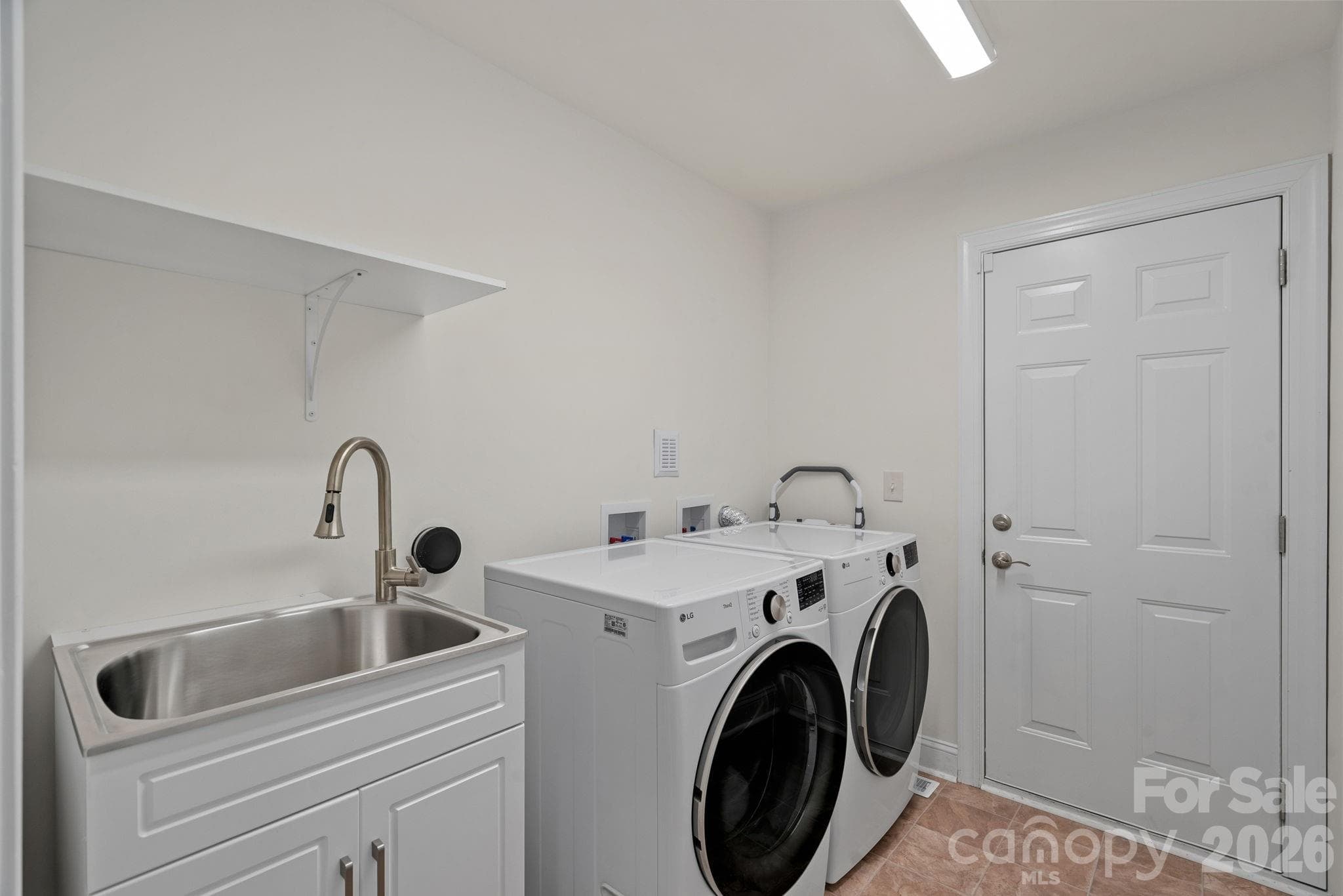 laundry room - new sink and cabinet - Huntersville