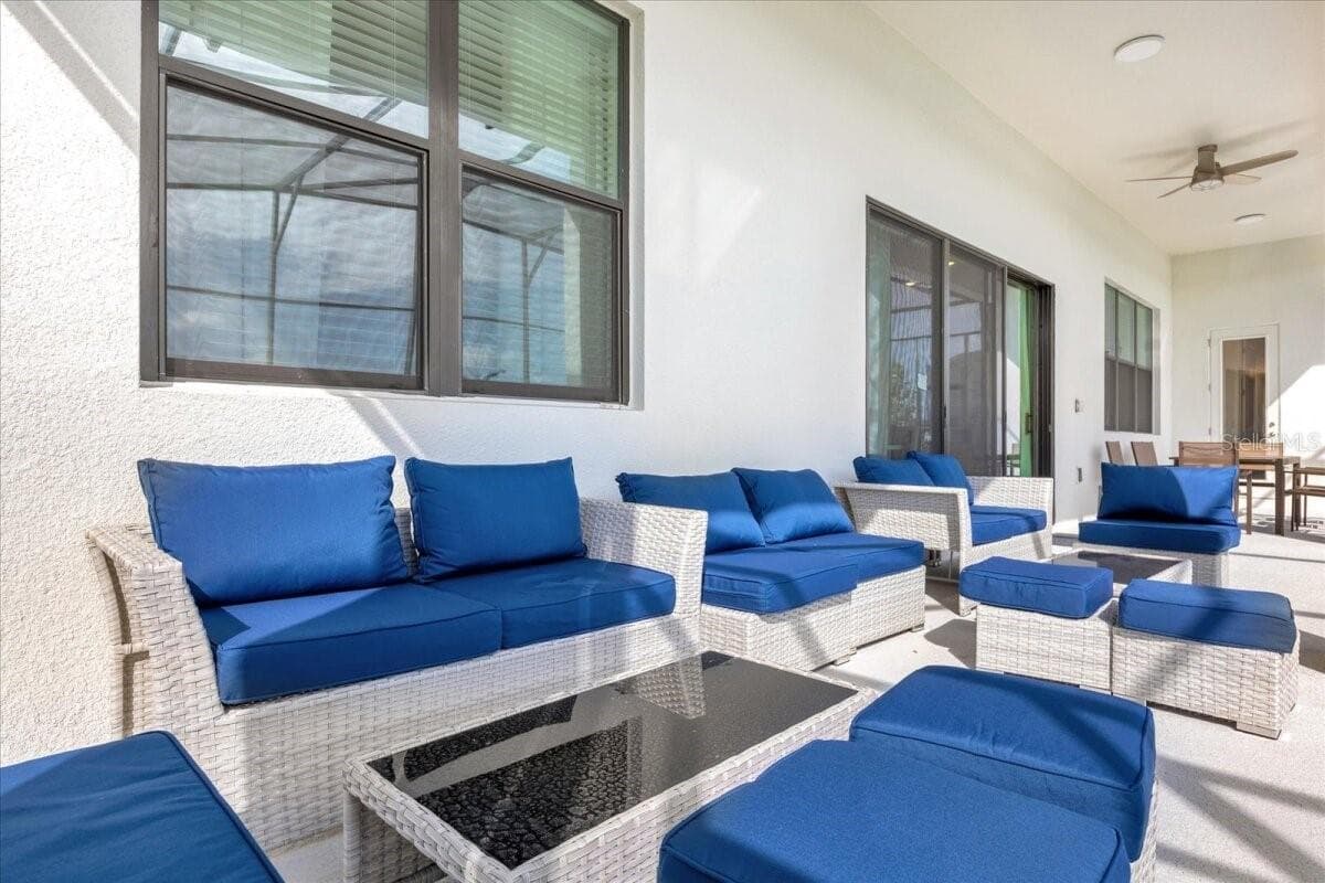Conversation area - covered lanai - 5830 HIGH SEAS DR, ORLANDO