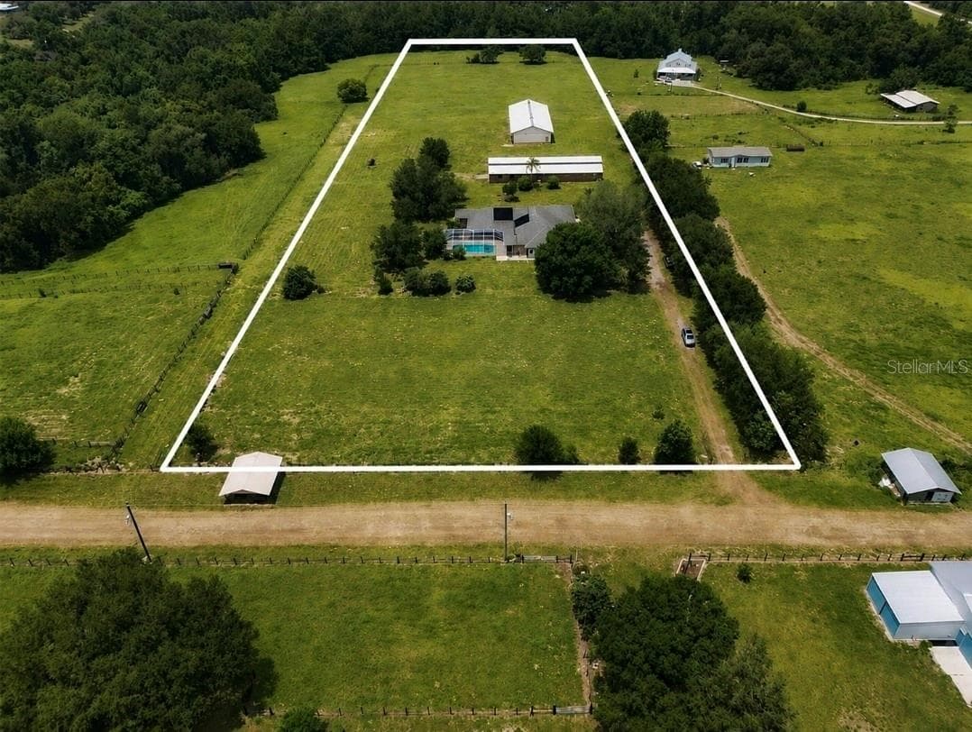 Grass gently greened with AI to demonstrate current conditions. - 24087 TWISTER LN, BROOKSVILLE