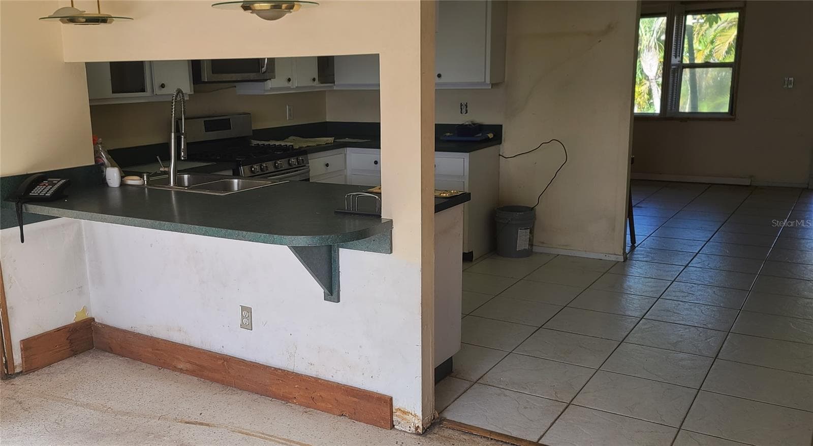 Kitchen thru 2 Living Room - 8665 MOCKINGBIRD LN, SEMINOLE