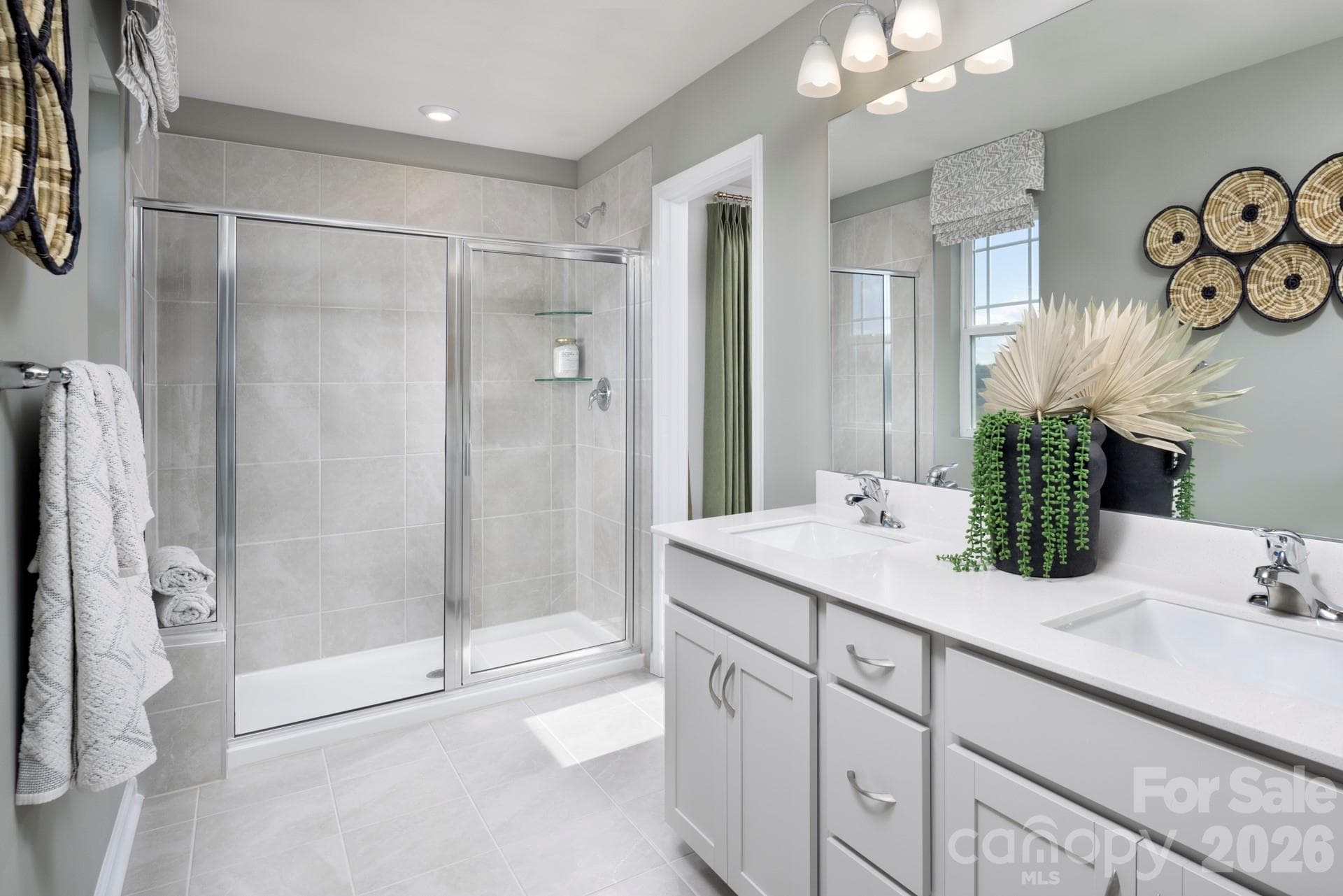 Photos shown are of a staged model home and are for illustrative purposes only. Floor plan is the same; however, finishes, colors, features, fixtures, furnishings, and design selections may vary from the actual home. - Charlotte