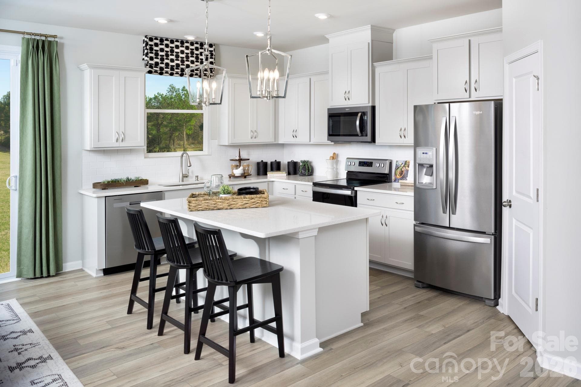 Photos shown are of a staged model home and are for illustrative purposes only. Floor plan is the same; however, finishes, colors, features, fixtures, furnishings, and design selections may vary from the actual home. - Charlotte