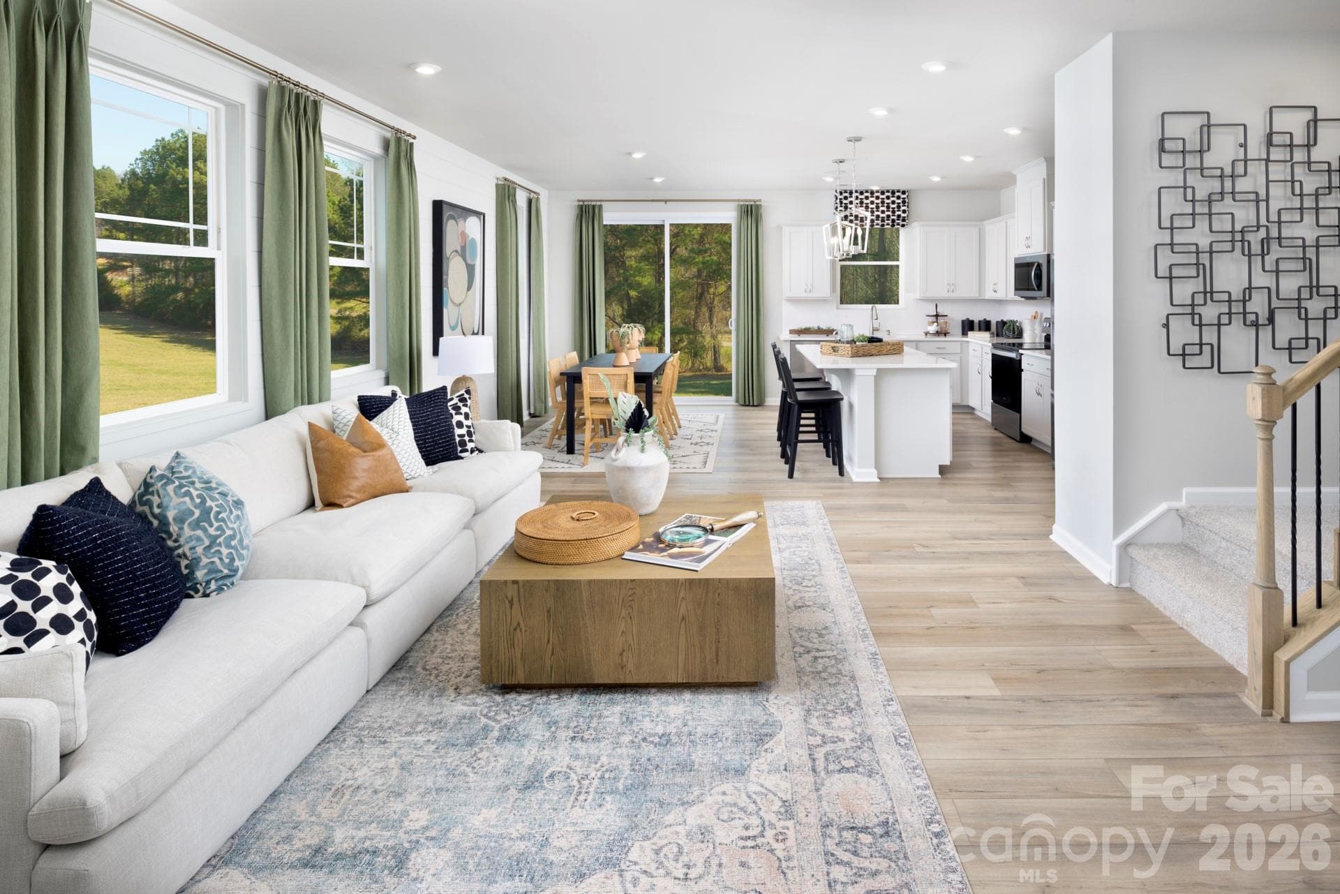 Photos shown are of a staged model home and are for illustrative purposes only. Floor plan is the same; however, finishes, colors, features, fixtures, furnishings, and design selections may vary from the actual home. - Charlotte