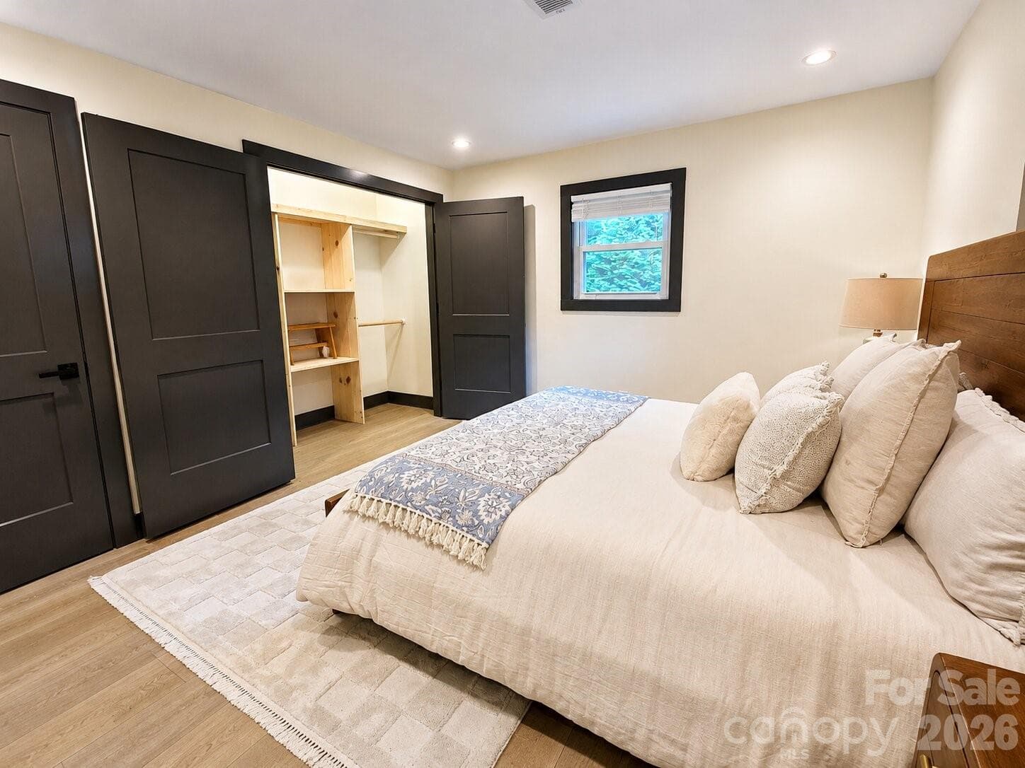 large closet with built-in shelving - Arden