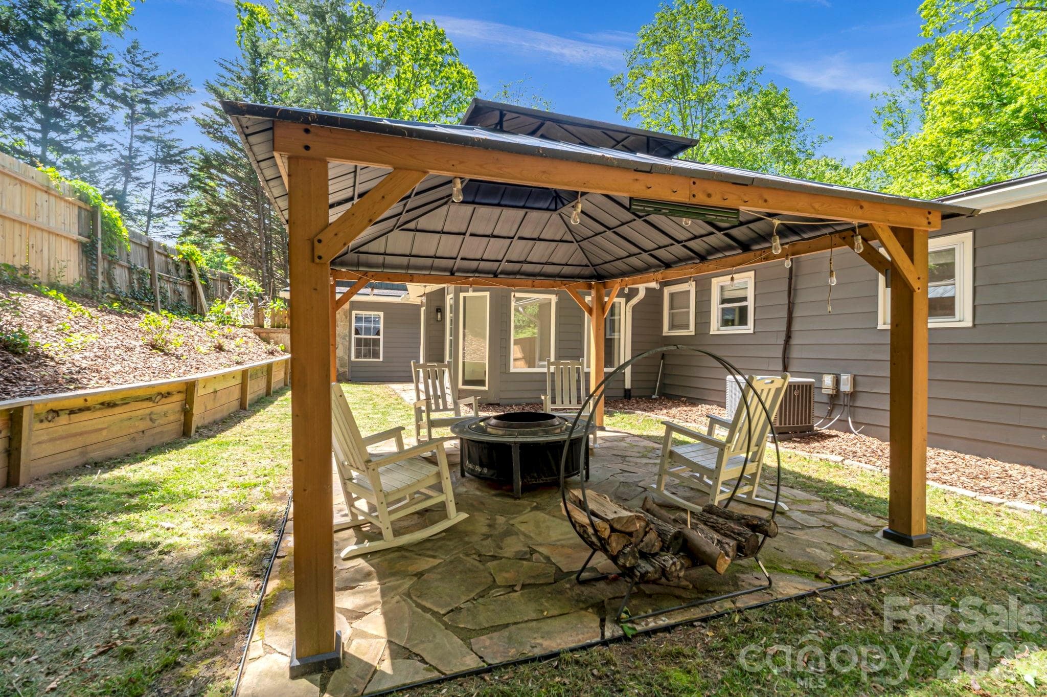 A charming setting for outdoor dining, celebrations, or peaceful afternoons. - Arden