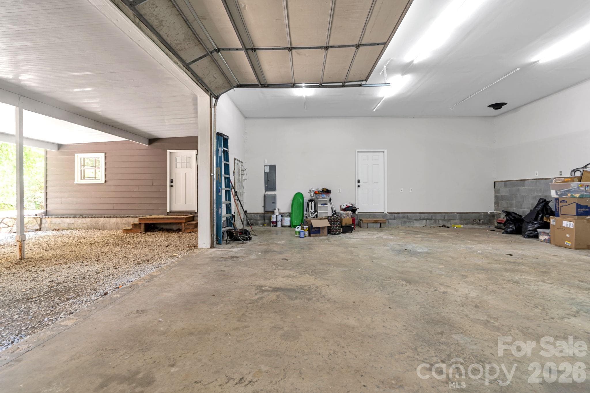 expansive garage space ready to fit your needs. - Arden