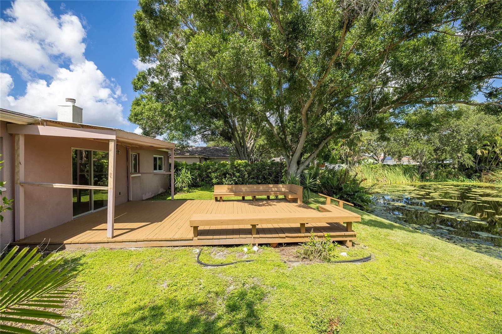 Large Deck overlooking peaceful water - 6355 102ND TER N, PINELLAS PARK