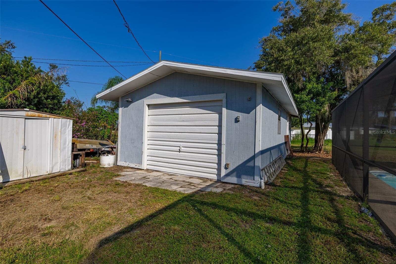 Detached 1 Car Garage/Workshop with 220 Electric - 608 CHEROKEE CIR, AVON PARK