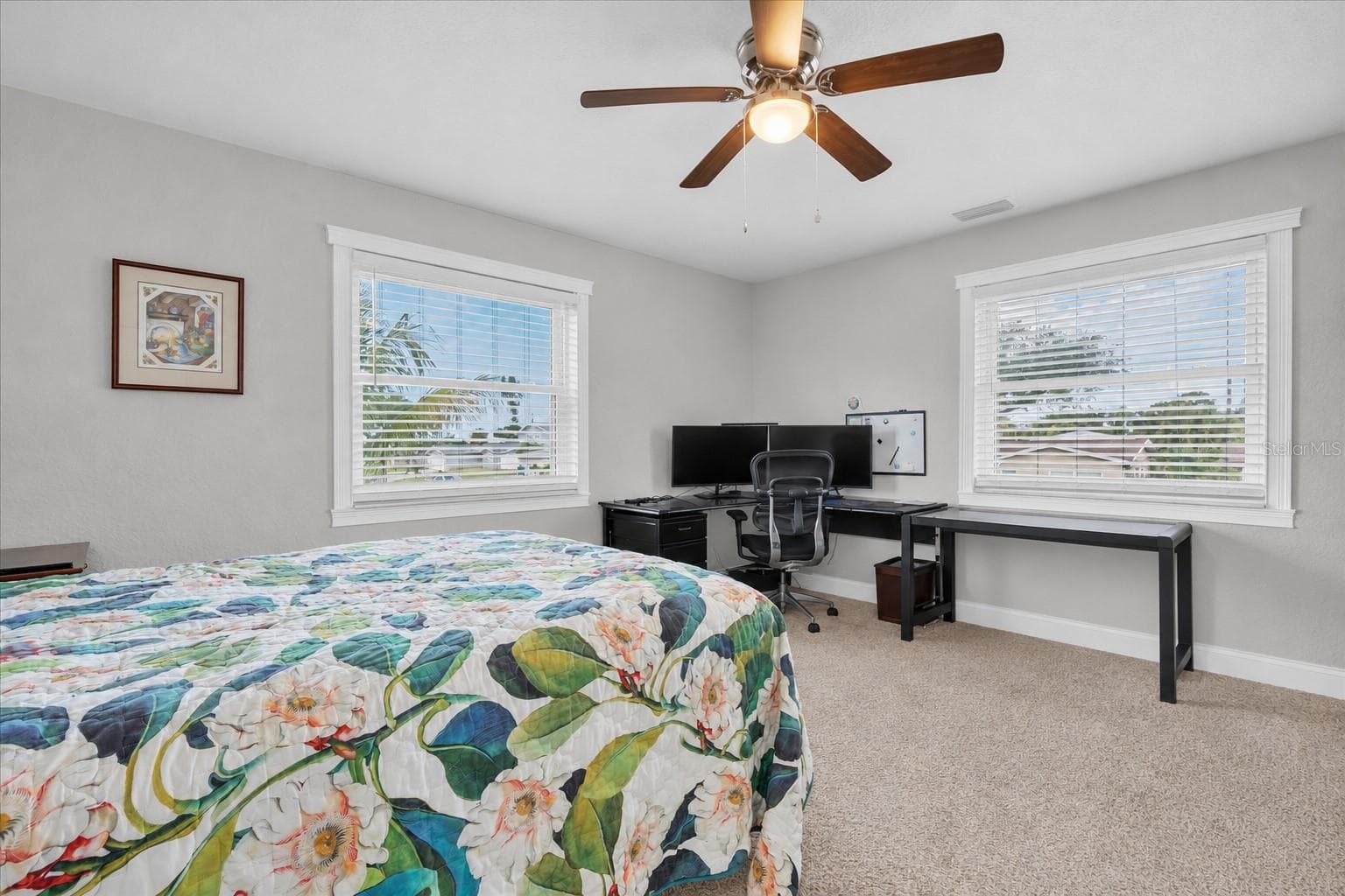 Spacious & inviting third bedroom with generous proportions, providing wonderful flexibility for family, guests or a home office. - 6501 MOCKINGBIRD WAY S, GULFPORT
