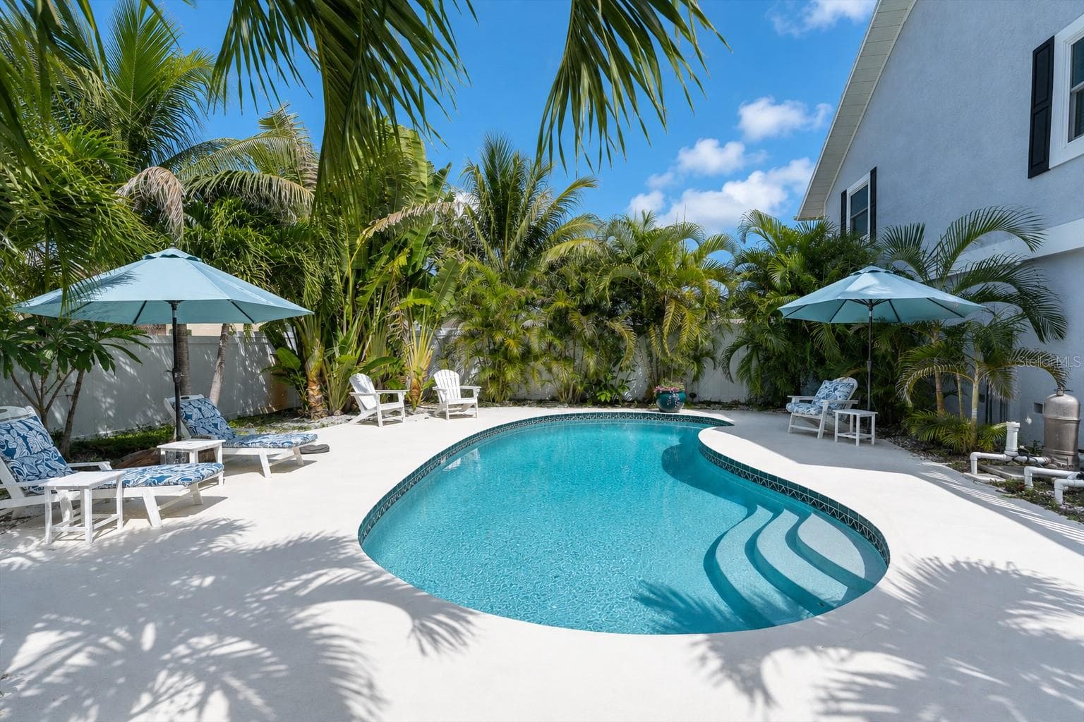 Whether you prefer floating & relaxing or swimming laps, the inviting pool offers the perfect place to enjoy Florida’s beautiful weather. - 6501 MOCKINGBIRD WAY S, GULFPORT