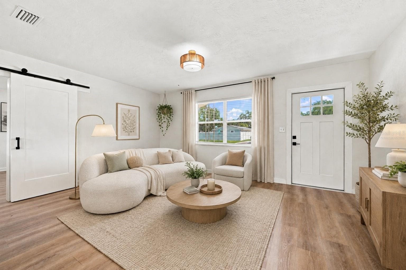 Virtually Staged Living Room - 933 41ST AVE NE, ST PETERSBURG
