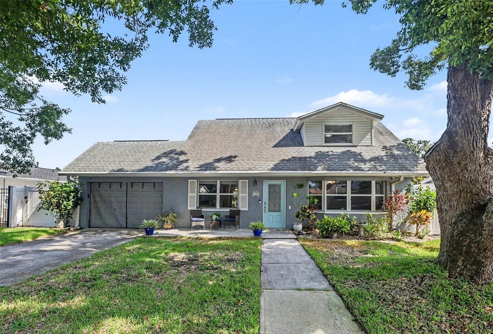 Nice view of the front from the sidewalk. - 12321 82ND AVE, SEMINOLE