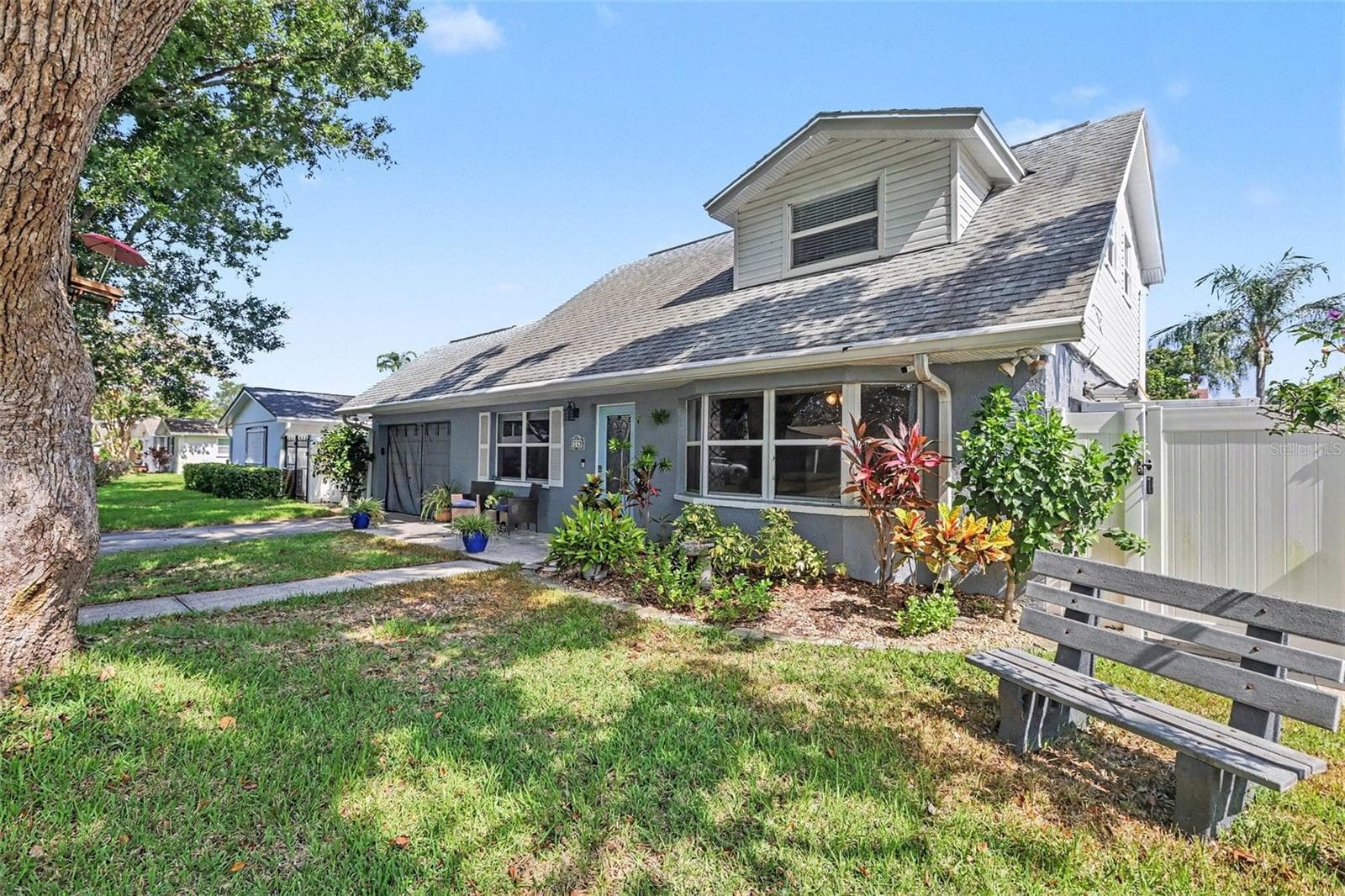 Trees for shade and music from the birds. Notice the distance from the home. - 12321 82ND AVE, SEMINOLE