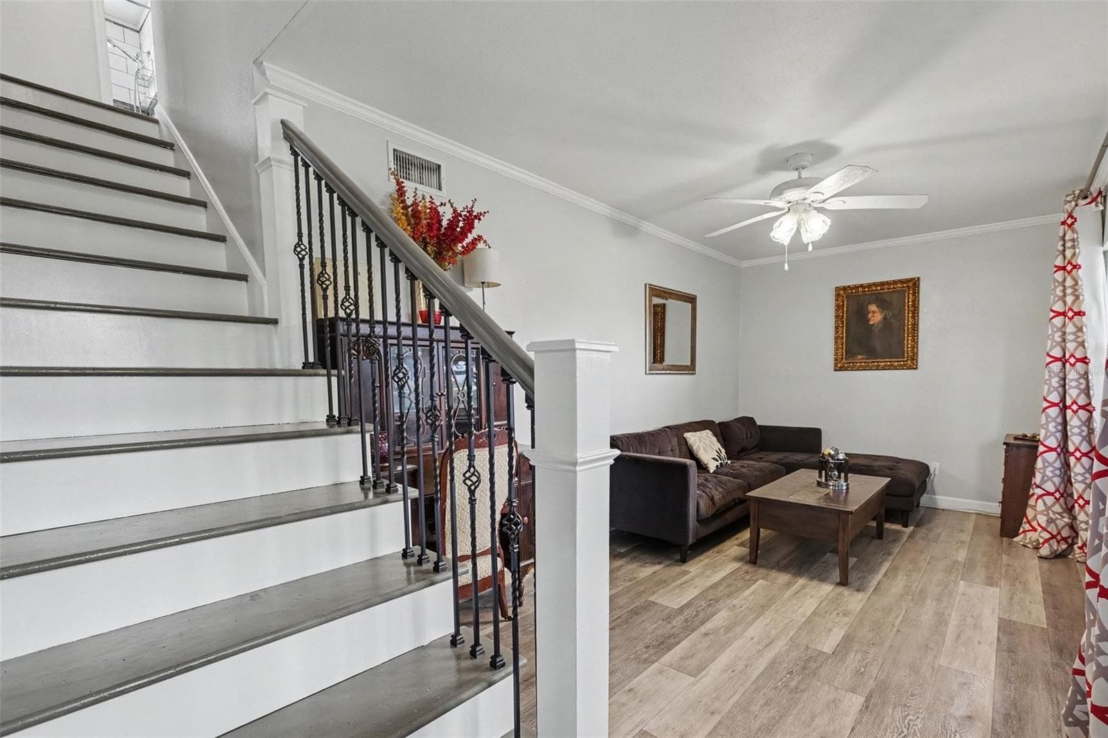 Upon enrtry the living room is on the right and private. Use as a living room, reading room, home office, or relaxing room. - 12321 82ND AVE, SEMINOLE