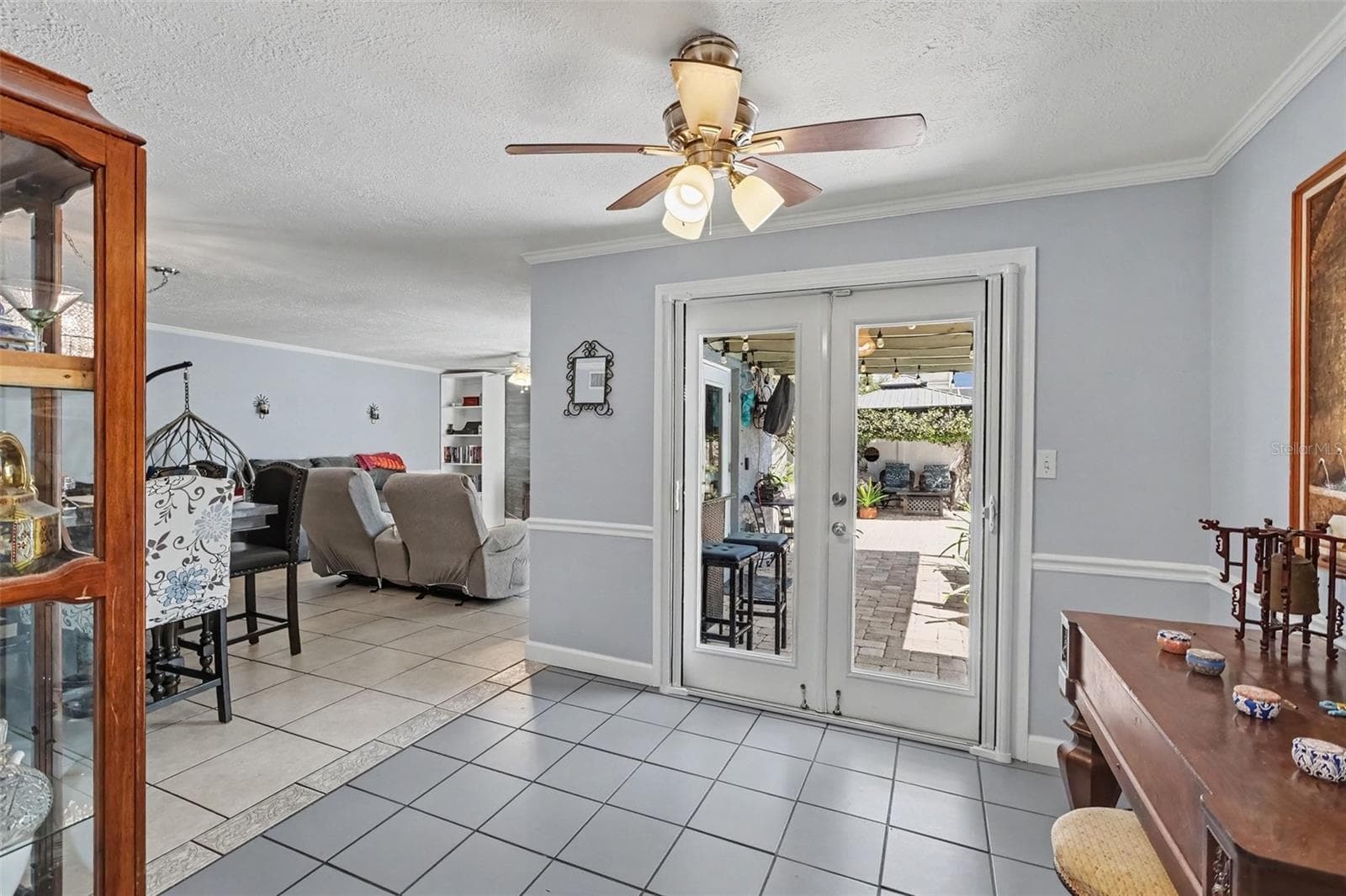There are three sets of French Doors that lead out to the beautiful backyard. - 12321 82ND AVE, SEMINOLE
