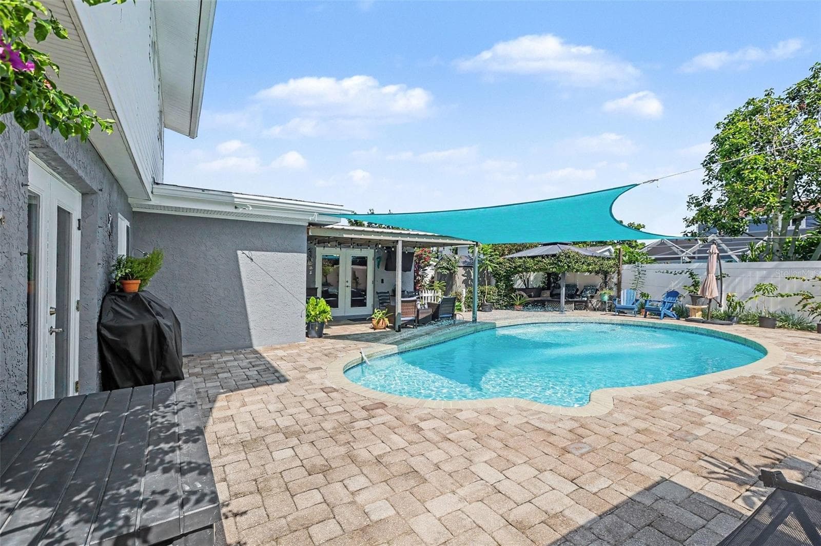 There are three sets of French Doors that lead out to this gorgeous space. - 12321 82ND AVE, SEMINOLE