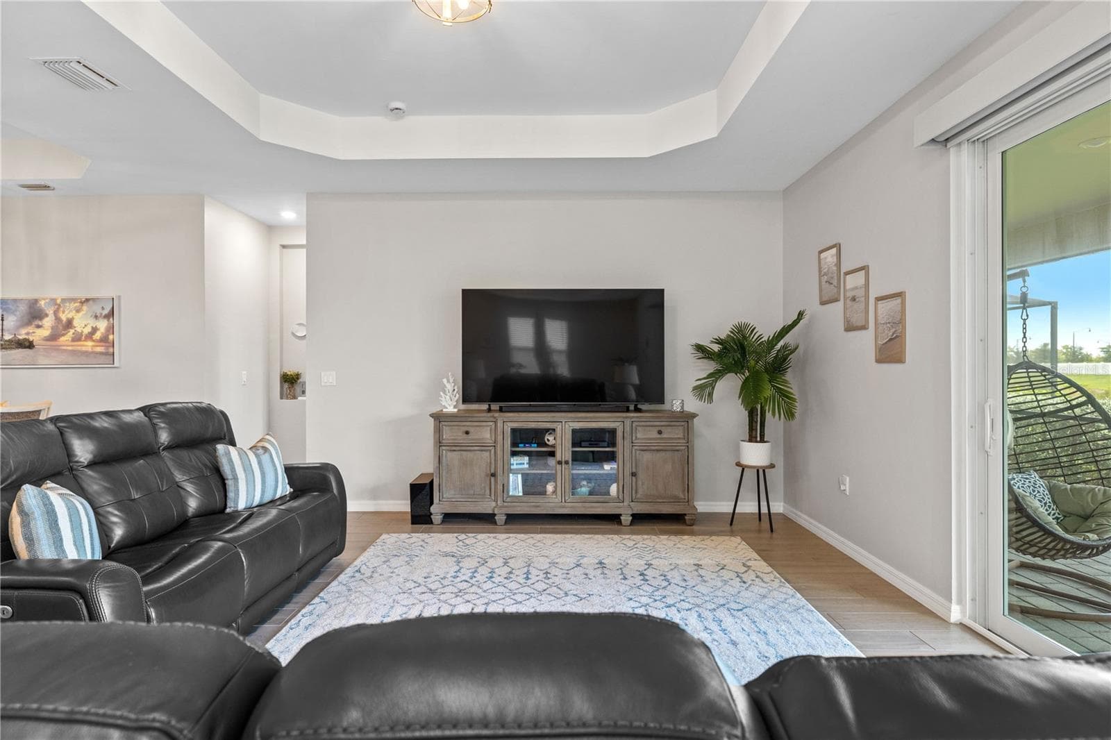 Great Room with Tray Ceiling, Patio doors to the Lanai - 17420 JADESTONE CT, VENICE