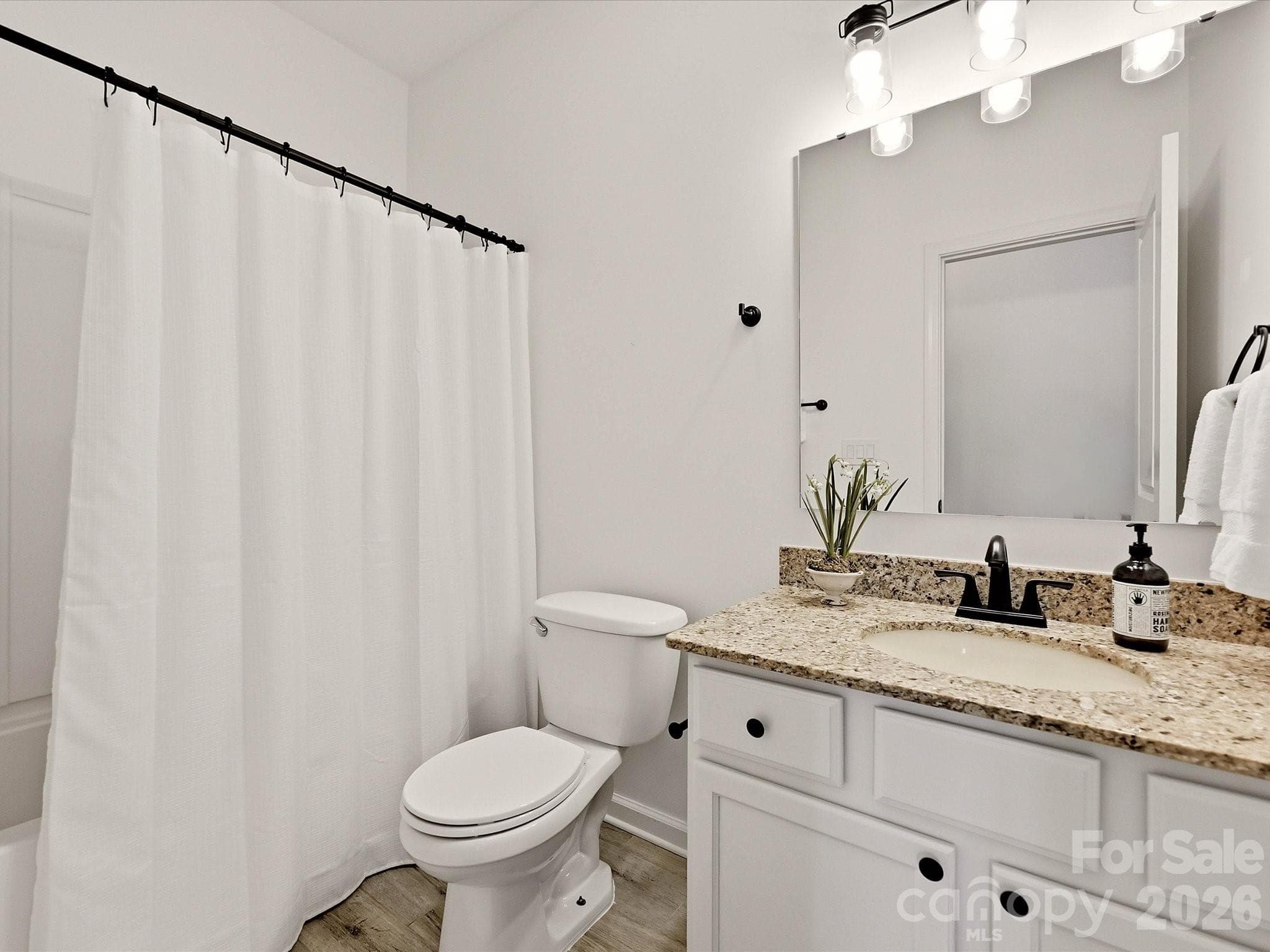 Granite and Tile grace the main bath - 216 Austin Field Court, Mount Holly