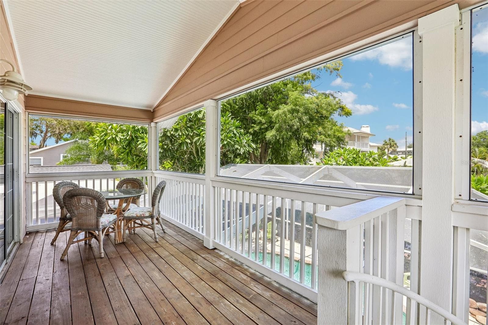 Sliders from the second floor screened patio - 3131 N CANAL DR, PALM HARBOR