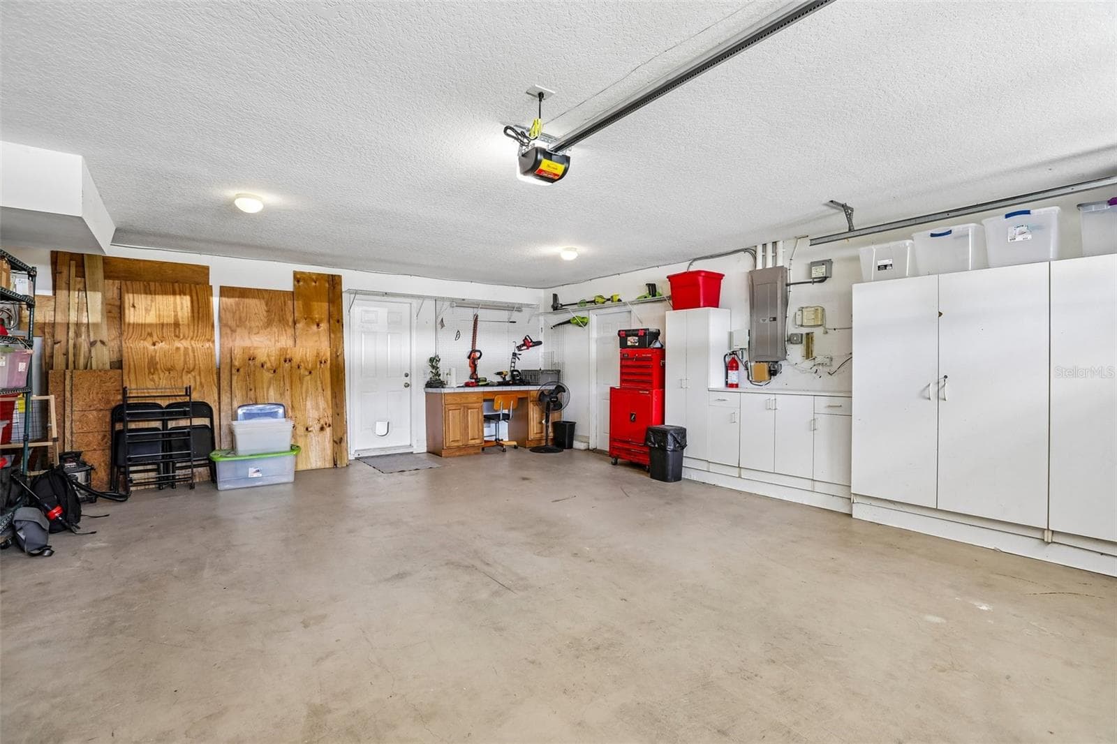 Large two car garage and newer door opener opener - 3131 N CANAL DR, PALM HARBOR