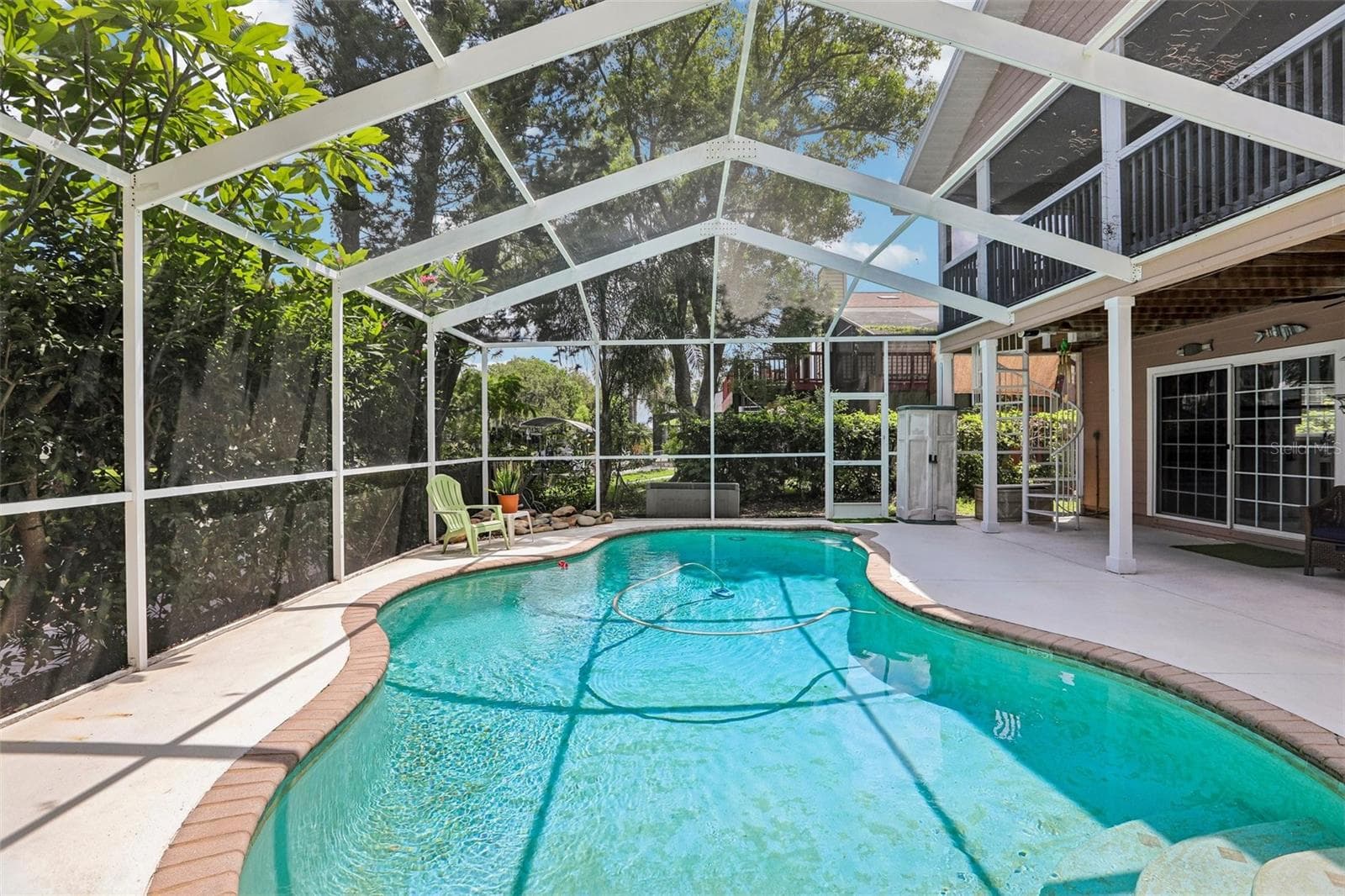 Heated pool and auto sweeper, two story screen - 3131 N CANAL DR, PALM HARBOR