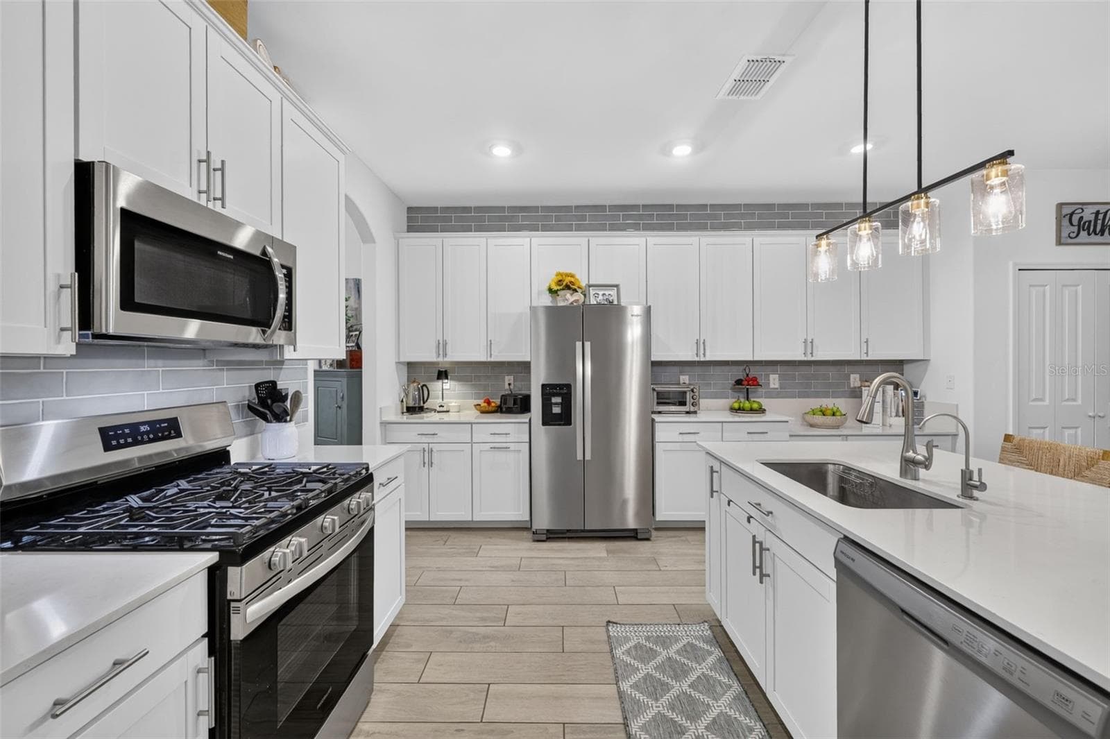 Large Open Kitchen with Quartz Counters - 15008 MISTY WATER XING, BRADENTON