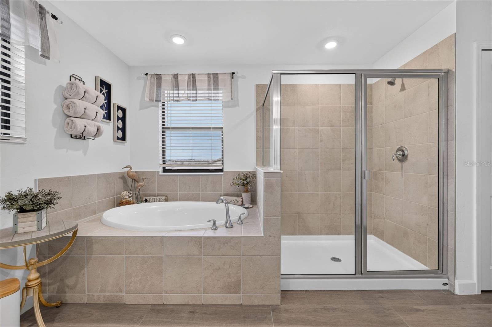 Primary Ensuite Bathroom with Garden Tub, Walk-in Shower and Quartz Counters on the Dual Vanity - 15008 MISTY WATER XING, BRADENTON