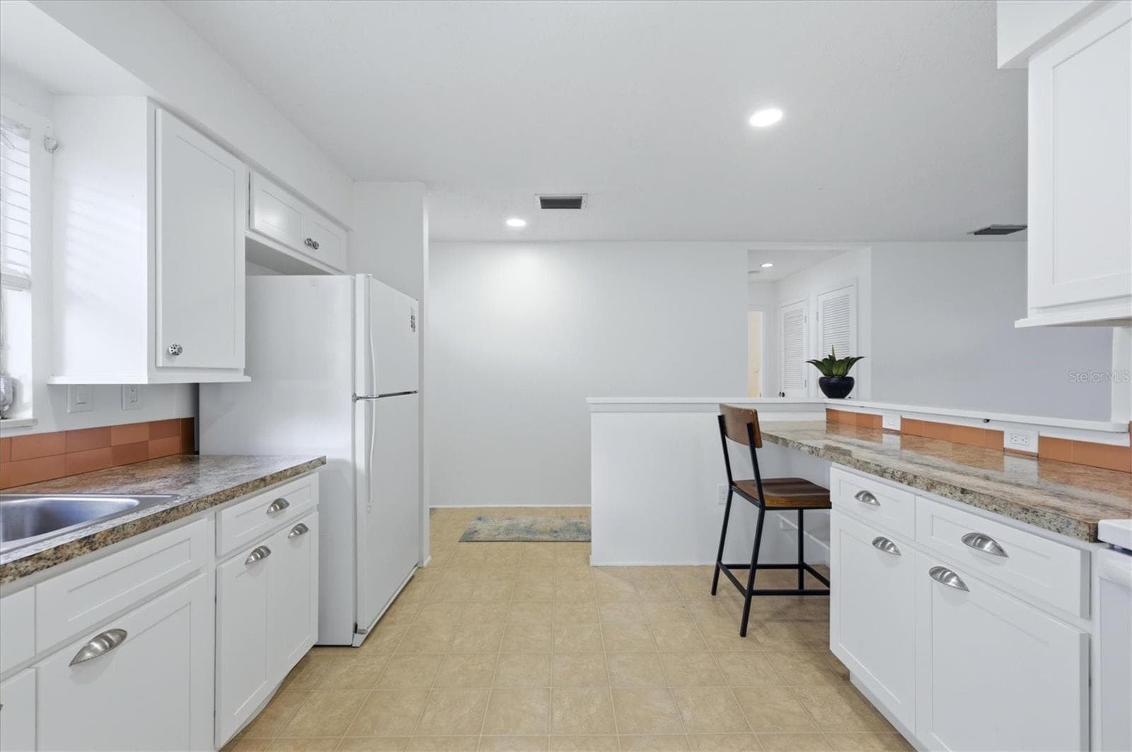 Spacious kitchen with convenient pull out drawers - 4538 PAWNEE TRL #197, SARASOTA