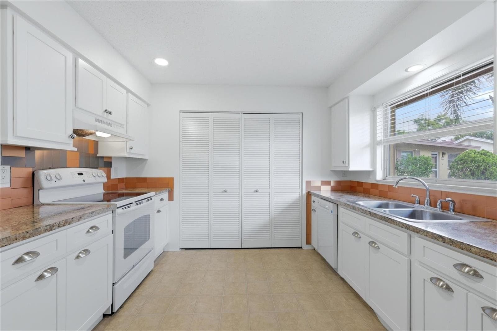 Inside laundry closet and pantry space - 4538 PAWNEE TRL #197, SARASOTA