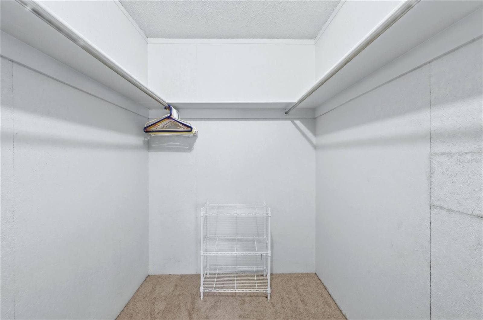 Walk in closet in Primary - 4538 PAWNEE TRL #197, SARASOTA