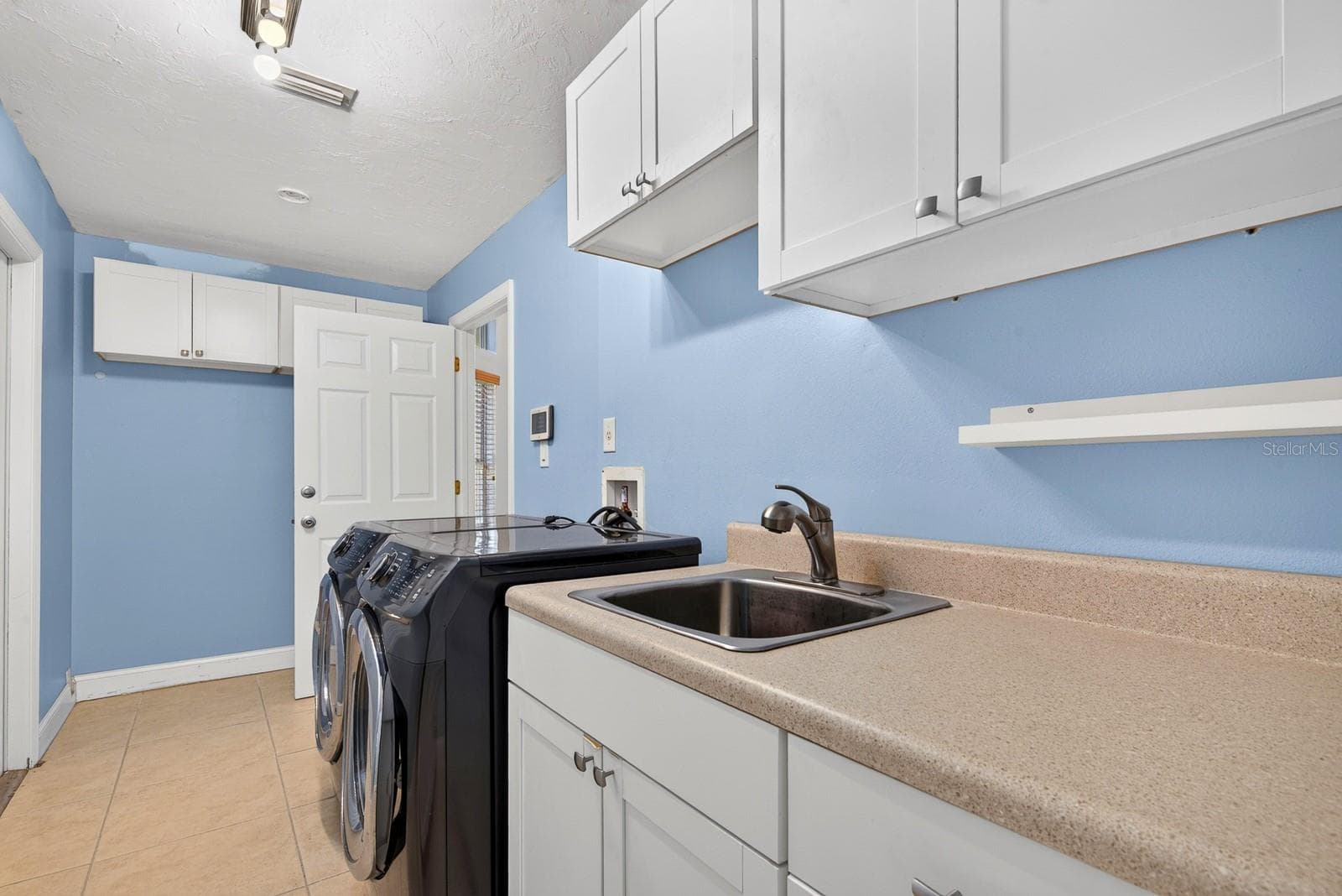 laundry room - 5410 61ST ST E, BRADENTON