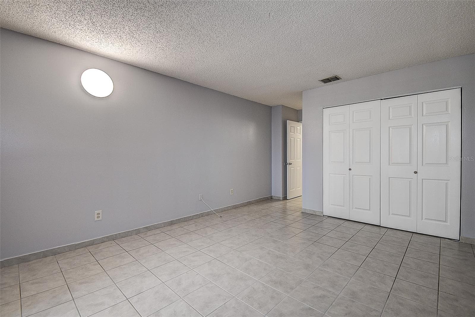 Primary bedroom with oversized closet - 10306 COUNCILS WAY, TEMPLE TERRACE