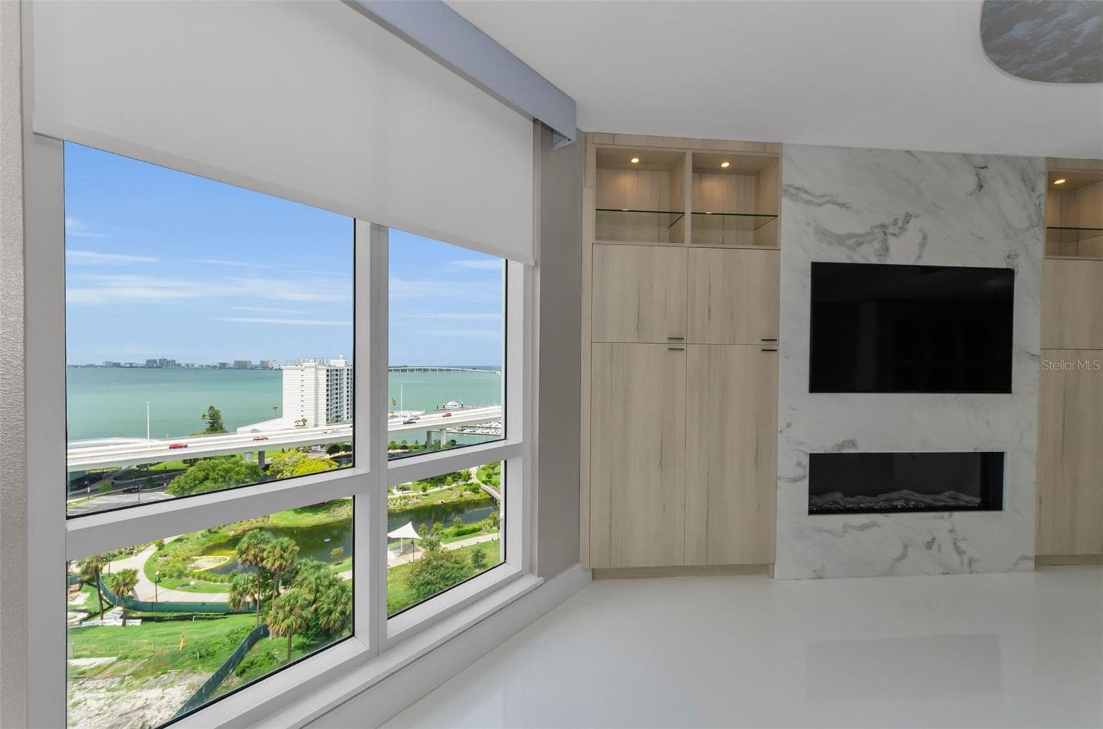 custom cabinets, Ethan Allen electric shades, built in TV and fireplace - 331 CLEVELAND ST #1101, CLEARWATER