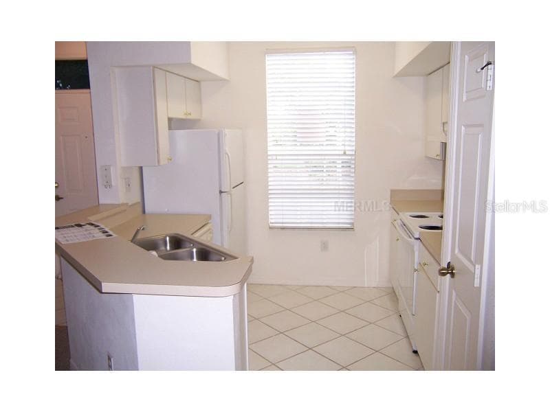 Condominium at 9310 LAKE CHASE ISLAND WAY #9310, TAMPA, photo 19 of 31