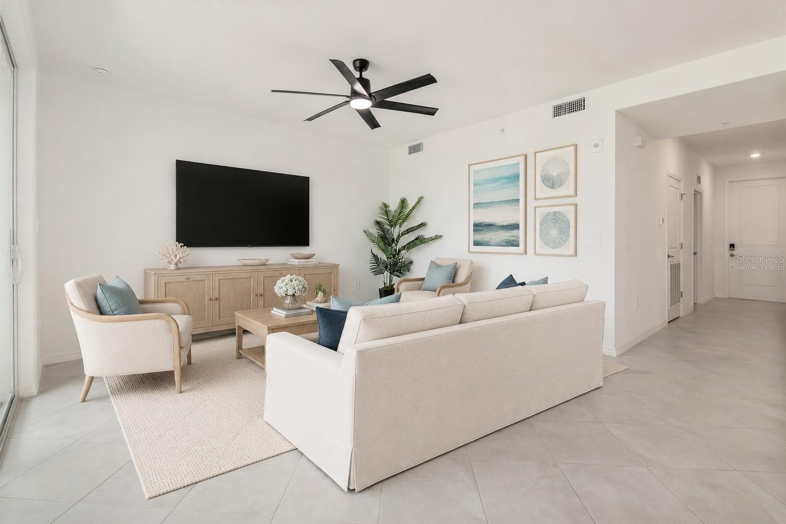 VIRTUALLY STAGED LIVING ROOM - 17625 OPAL SAND DR #307, VENICE
