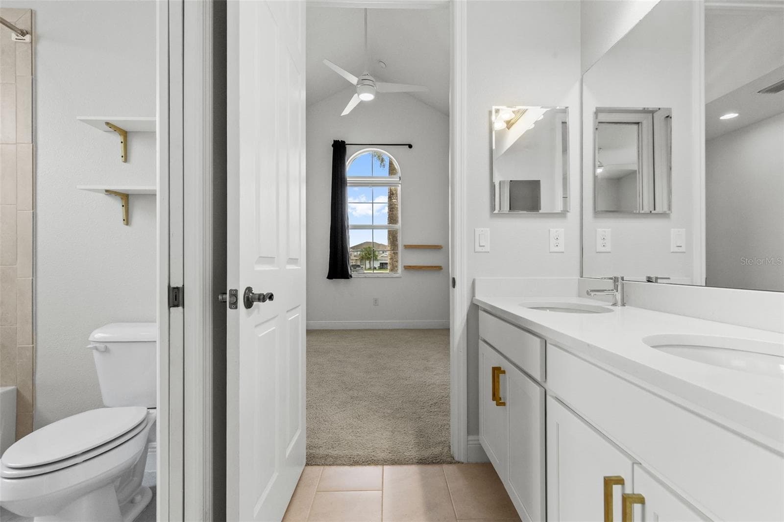 Jack-N-Jill Bathroom - 19714 LONESOME PINE DR, LAND O LAKES