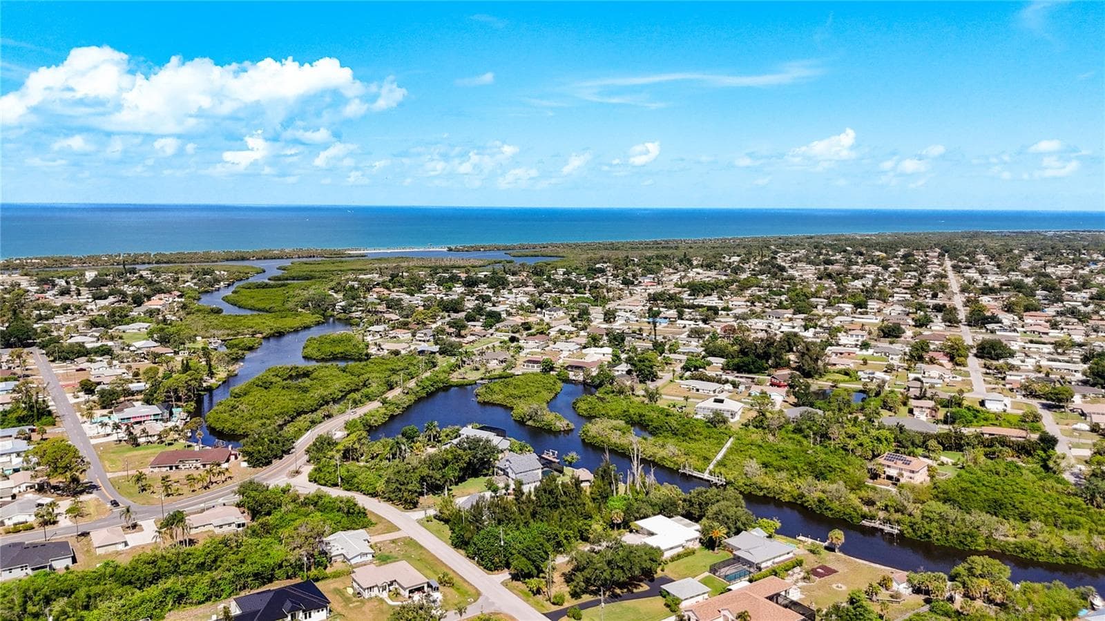 Aerial view showing creek network and Gulf proximity - LEMON BAY DR, VENICE