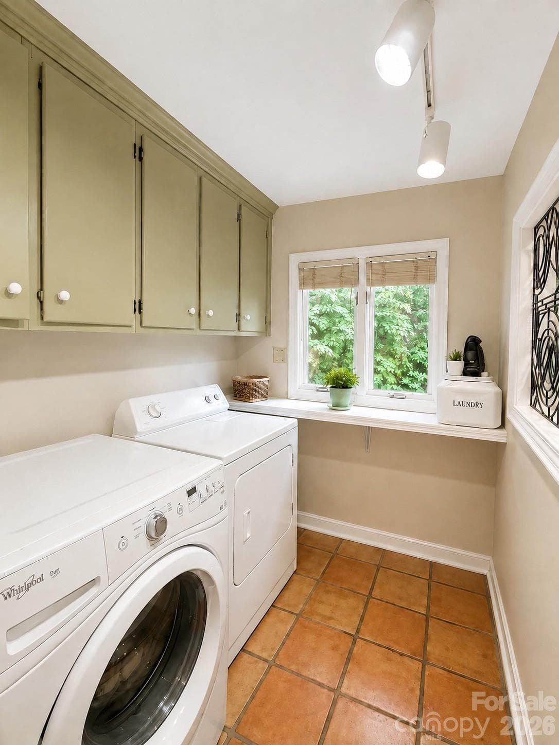 Laundry room with lots of storage - 4821 Elmhurst Drive NE, Hickory