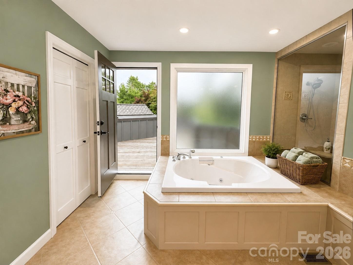 Walk out to the private deck from the primary bath - 4821 Elmhurst Drive NE, Hickory