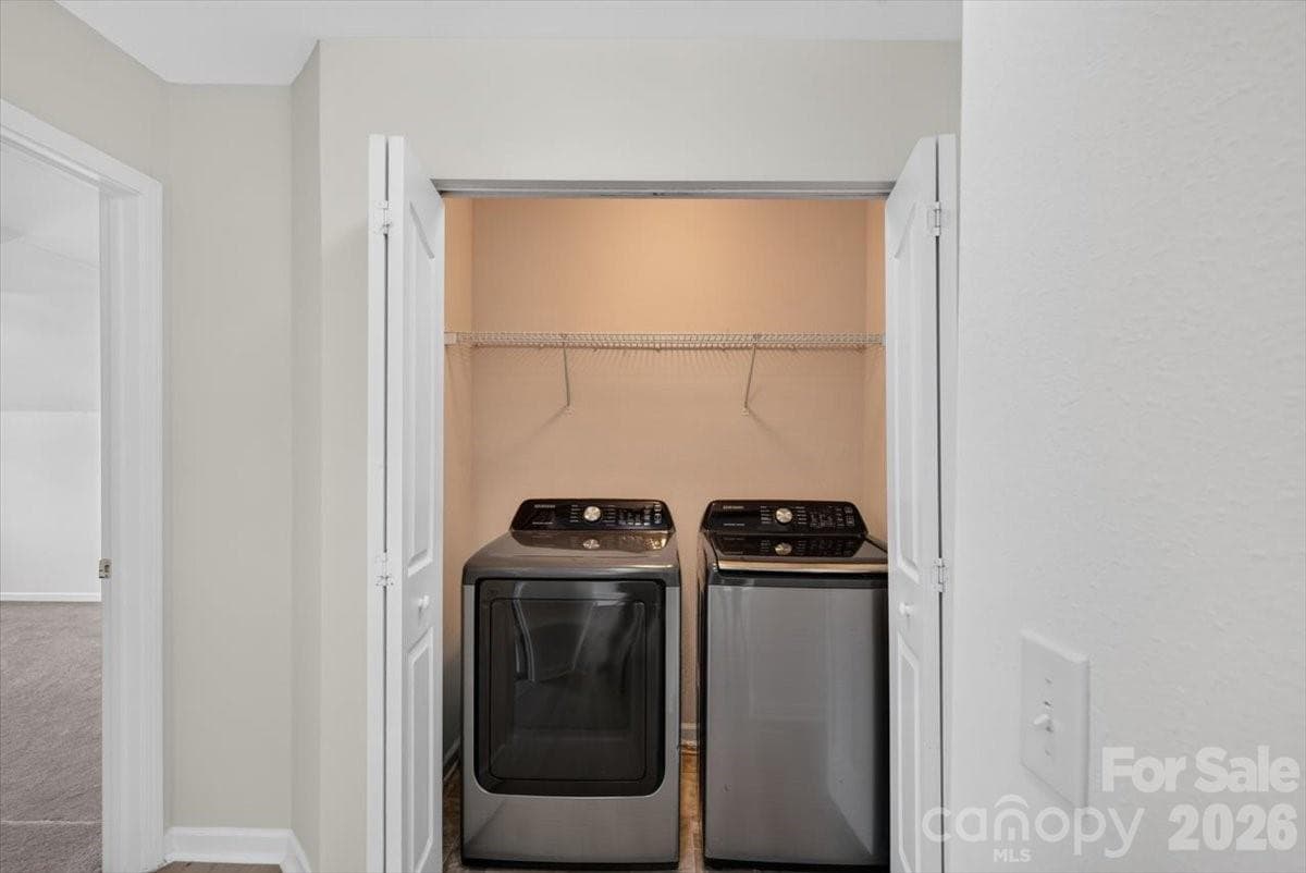 Laundry nook located upstairs - 8100 Laurel Run Drive, Charlotte