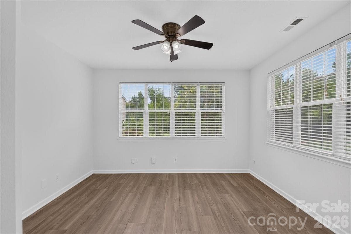 flex room off of living area and kitchen great for a play space or office - 8100 Laurel Run Drive, Charlotte