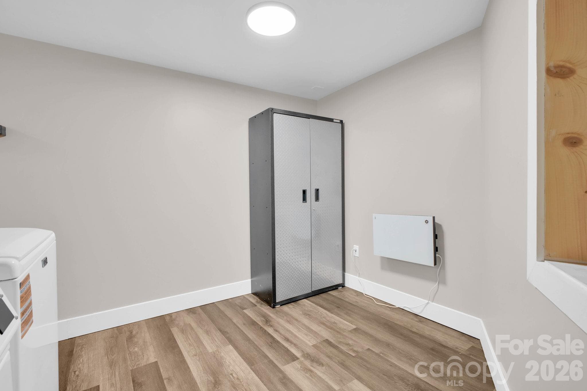 Laundry Room with Storage Cabinet - 119 Beechwood Lane, Beech Mountain